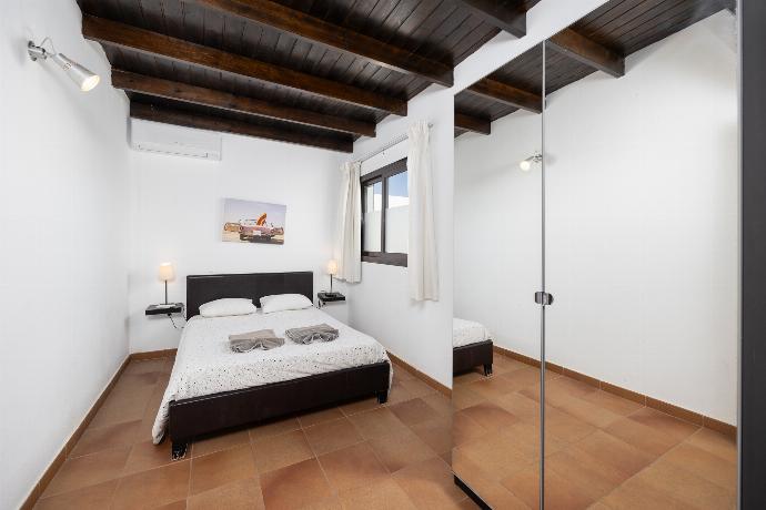 Double bedroom with A/C . - Villa Aurora . (Photo Gallery) }}