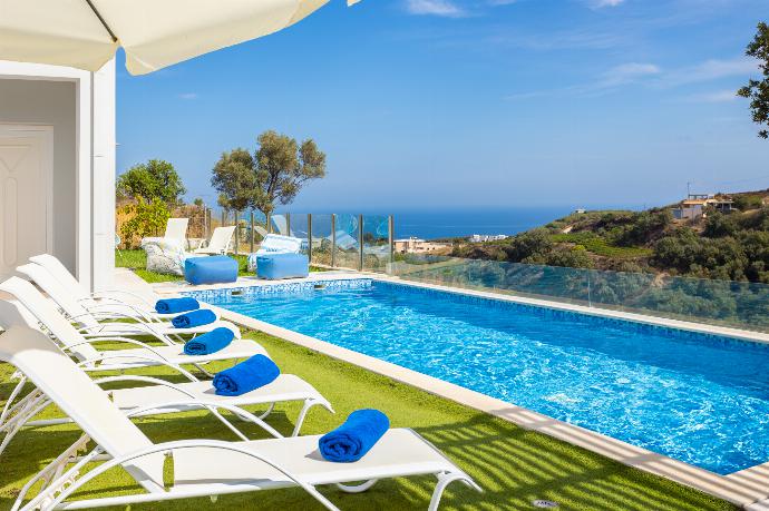 Private pool, terrace, and garden with sea views . - Villa Sonata . (Photo Gallery) }}