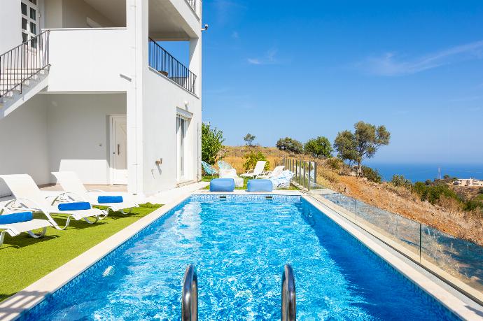 Private pool, terrace, and garden with sea views . - Villa Sonata . (Photo Gallery) }}