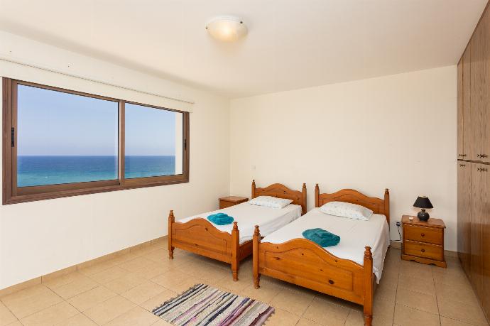 Twin bedroom with A/C and sea views . - Villa Serena . (Photo Gallery) }}