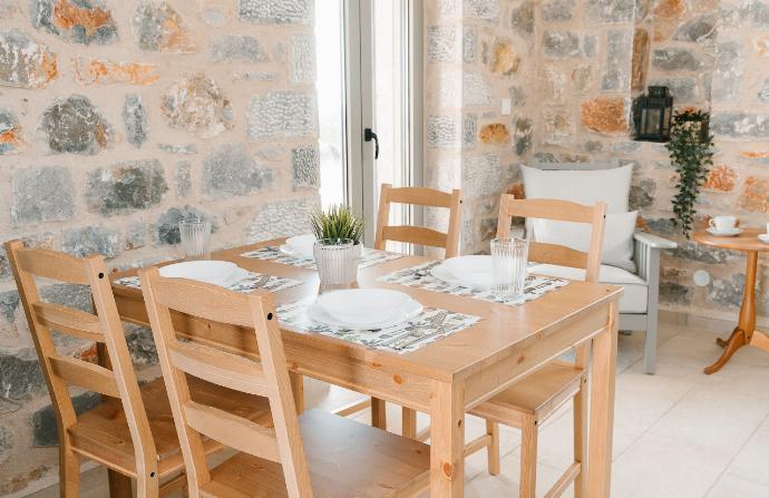 ,Dining table . - Villa Dioni Thio . (Photo Gallery) }}