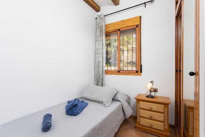 Single bedroom with A/C . - Villa Bonifacio . (Photo Gallery) }}