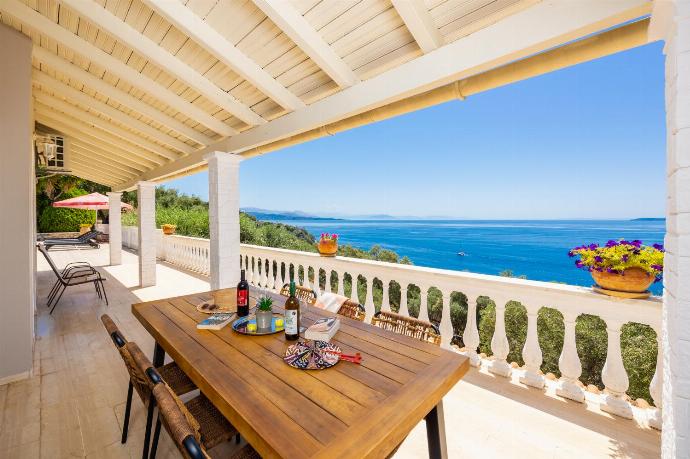 Sheltered terrace area with panoramic sea views . - Villa Theodora . (Photo Gallery) }}