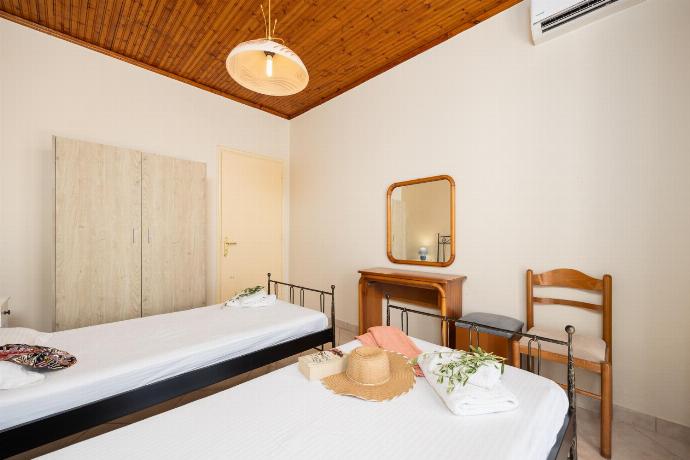 Twin bedroom with A/C and sea views . - Villa Theodora . (Photo Gallery) }}