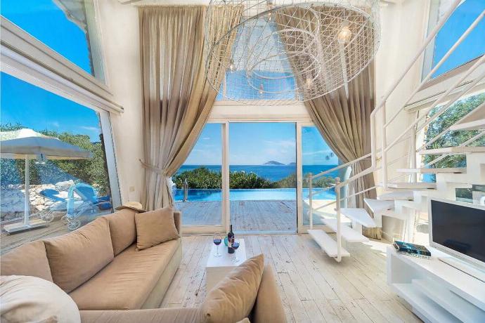 Open-plan living room with sofa,  WiFi internet, satellite TV, and sea views . - Villa Pavilion . (Photo Gallery) }}