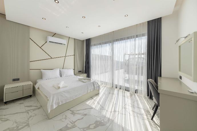 Double bedroom with A/C and upper terrace access . - Villa Durdane Sultan . (Photo Gallery) }}