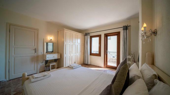 Double bedroom with en suite bathroom, A/C, and upper terrace access . - Villa Pearl . (Photo Gallery) }}