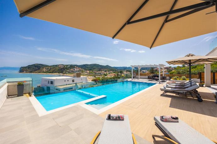 Private pool and terrace with sea views . - Villa Halcyon . (Photo Gallery) }}