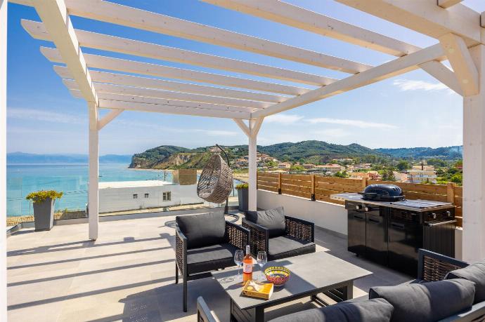 Terrace are with BBQ and sea views . - Villa Halcyon . (Photo Gallery) }}