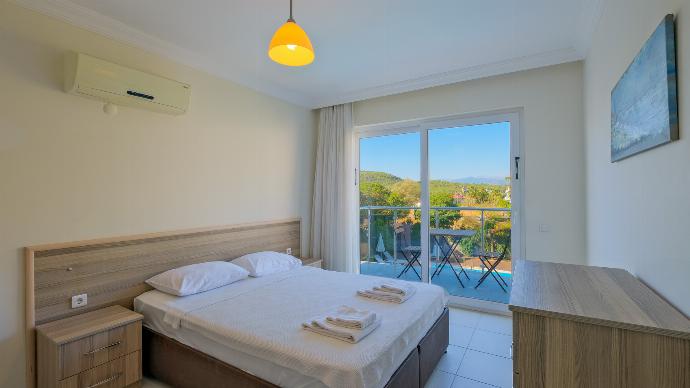 Double bedroom with upper terrace access . - Orka Crystal Villa . (Галерея фотографий) }}