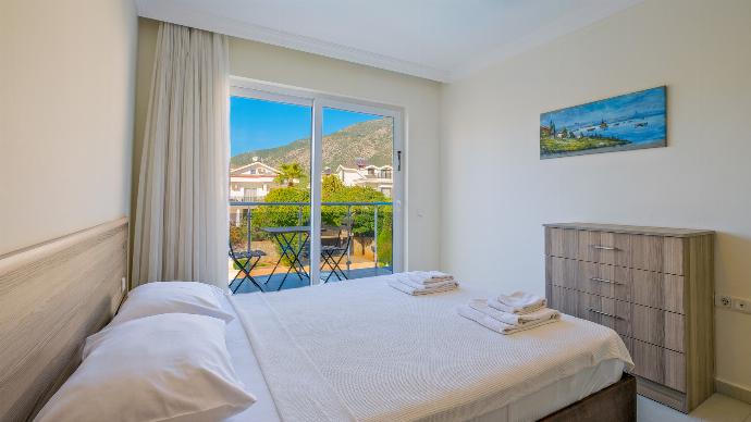 Double bedroom with upper terrace access . - Orka Crystal Villa . (Галерея фотографий) }}