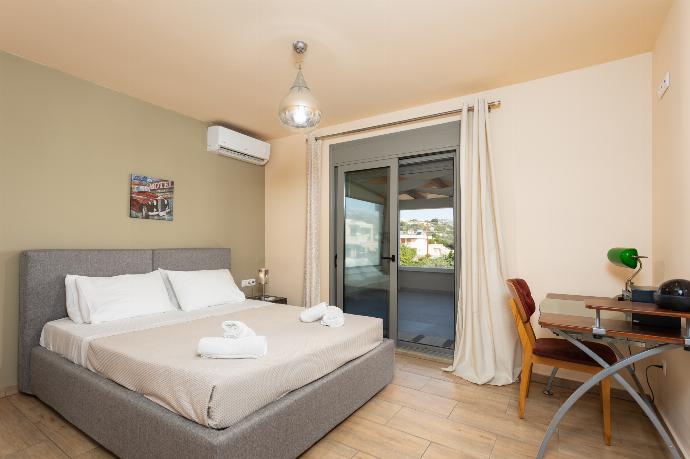 Double bedroom with A/C . - Villa Ammos . (Photo Gallery) }}