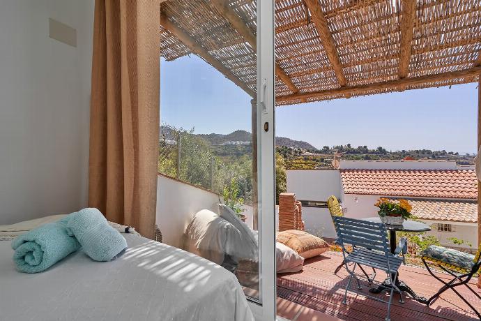 Double bedroom with A/C and terrace access with panoramic view . - Villa Los Espejos De Frigiliana . (Photo Gallery) }}