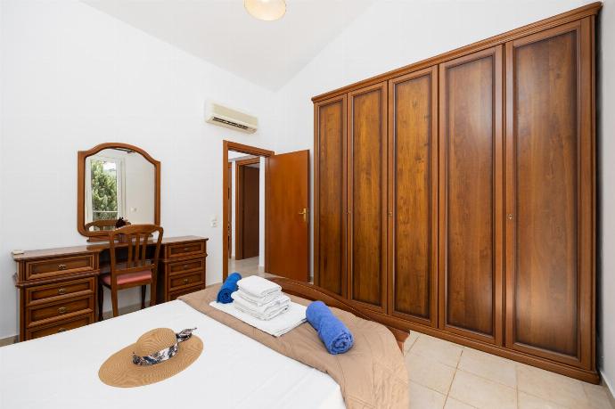 Double bedroom with A/C . - Villa Afrodite Classico . (Photo Gallery) }}