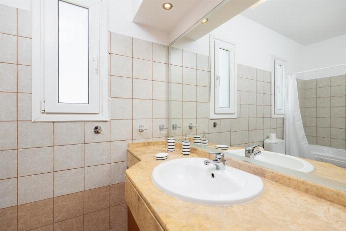 Family bathroom with bath and shower . - Villa Afrodite Classico . (Photo Gallery) }}