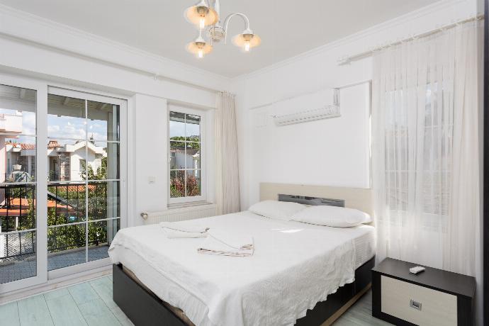 Double bedroom with A/C . - Villa Crystal . (Photo Gallery) }}