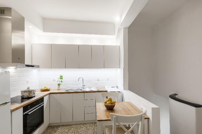 Equipped kitchen . - Esperos Apartment . (Photo Gallery) }}