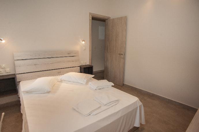 Double bedroom with A/C . - Villa Gerasmia . (Photo Gallery) }}
