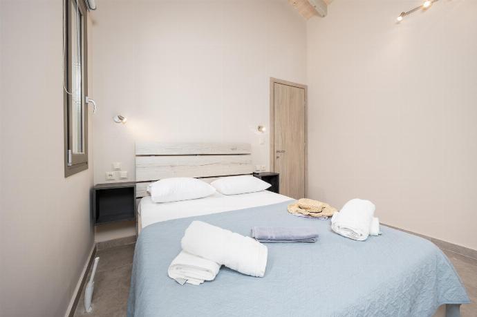 Double bedroom with A/C . - Villa Gerasmia . (Photo Gallery) }}