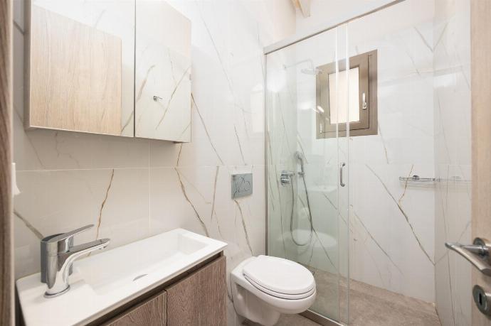 Family bathroom with shower . - Villa Gerasmia . (Photo Gallery) }}