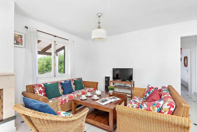 Open plan living room with A/C patio doors comfortable sofas, WiFi, TV dining area . - Villa Binilisa . (Photo Gallery) }}