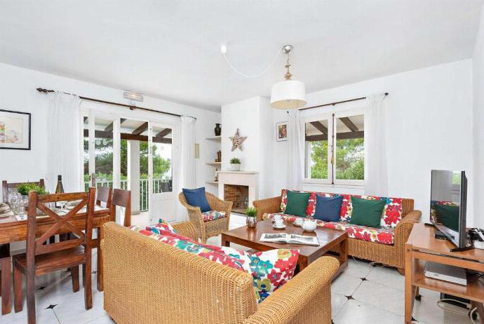 Open plan living room with A/C patio doors comfortable sofas, WiFi, TV dining area . - Villa Binilisa . (Photo Gallery) }}
