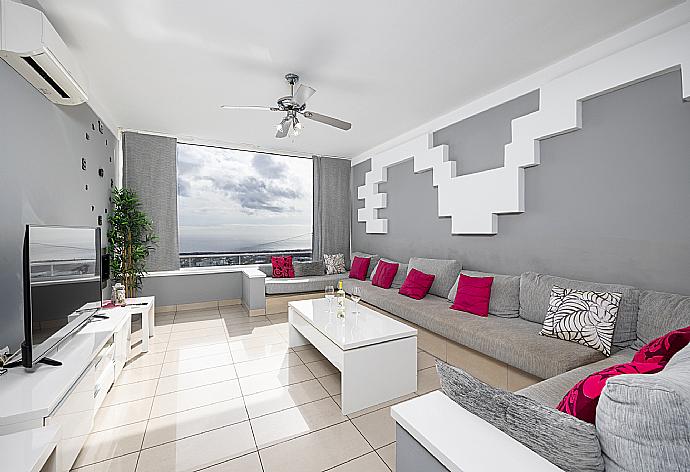 Living room with sofa, dining area, A/C, WiFi internet, satellite TV, and sea views . - Casa Marina . (Photo Gallery) }}