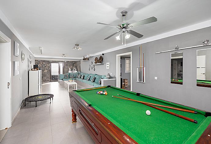 Living room with sofa, TV, and pool table . - Casa Marina . (Photo Gallery) }}