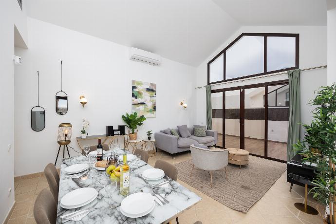 Living room with sofa, dining area, A/C, WiFi internet, and satellite TV . - Villa Cindy . (Fotogalerie) }}