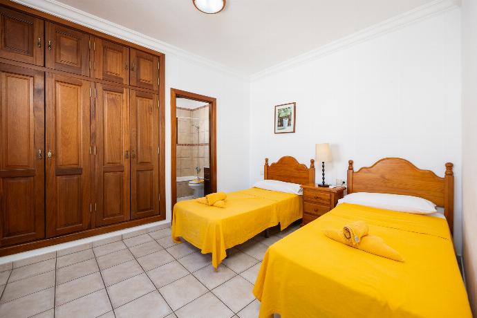 Twin bedroom with en suite bathroom and A/C . - Villa Florencia . (Photo Gallery) }}