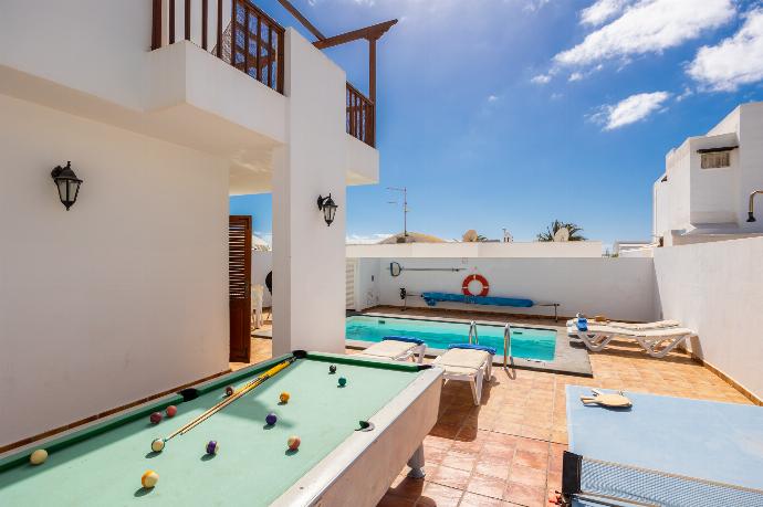 Terrace area with pool table and table tennis . - Villa Florencia . (Photo Gallery) }}