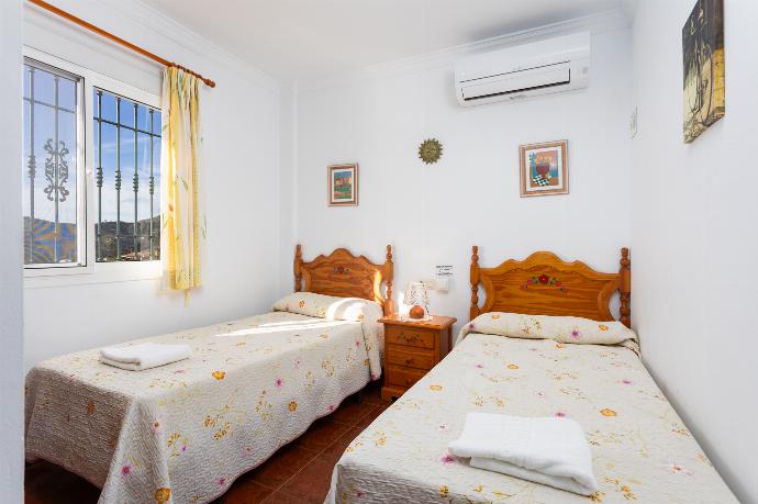 Twin bedroom with A/C . - Villa Conchi Frigiliana . (Photo Gallery) }}