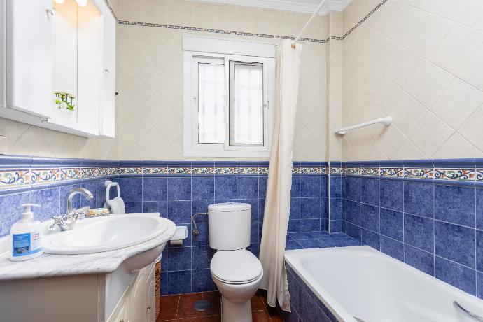 Family bathroom with bath and shower . - Villa Conchi Frigiliana . (Photo Gallery) }}
