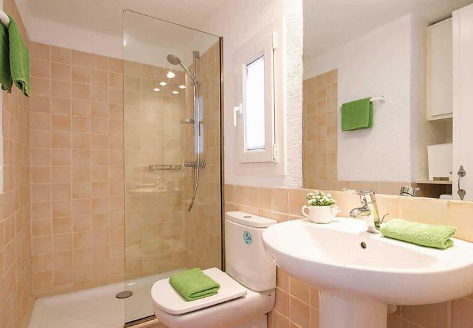 En suite bathroom with shower . - Villa Binipaco . (Photo Gallery) }}