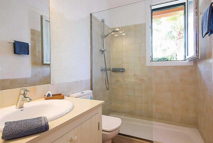 En suite bathroom with shower . - Villa Binipaco . (Photo Gallery) }}