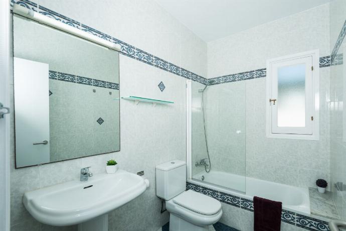 En suite bathroom with shower . - Villa Patri . (Photo Gallery) }}