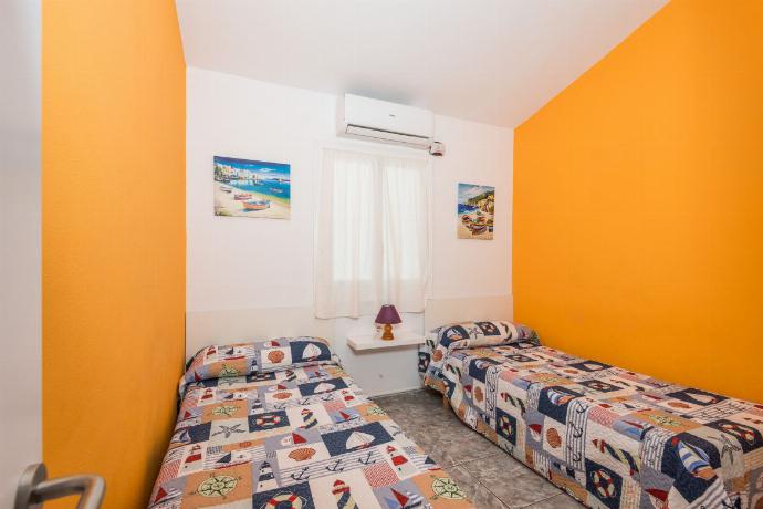 Twin bedroom with A/C . - Villa Patri . (Photo Gallery) }}