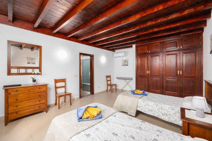 Twin bedroom with A/C . - Villa Salar . (Photo Gallery) }}