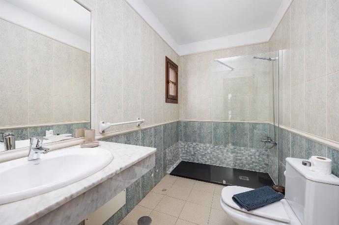 En suite bathroom with shower . - Villa Blanca . (Photo Gallery) }}