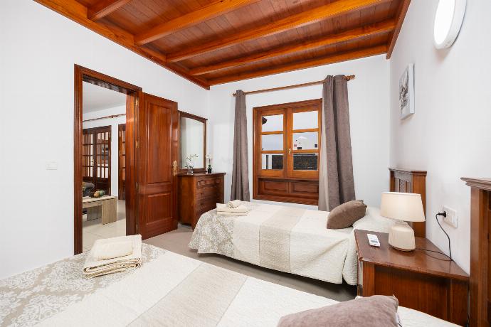 Twin bedroom with A/C . - Villa Blanca . (Photo Gallery) }}