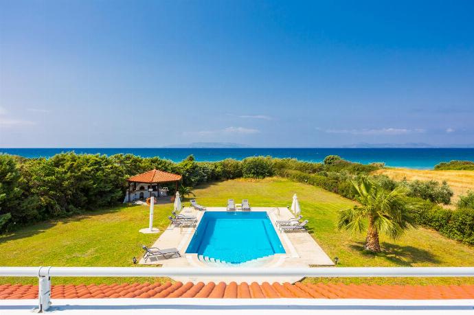 Private pool, terrace, and garden with sea views . - Villa Sunset . (Photo Gallery) }}