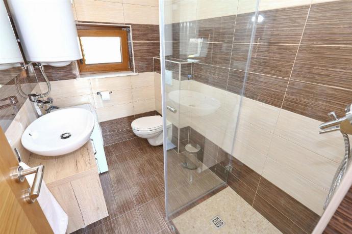 En suite bathroom with shower . - Villa Tereza . (Photo Gallery) }}