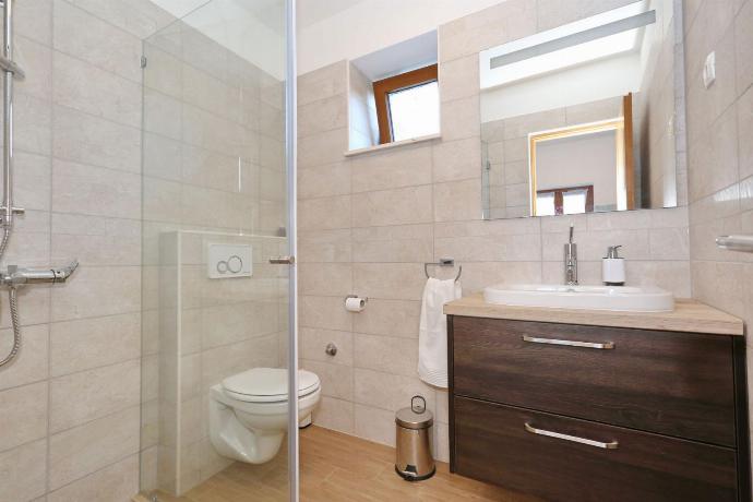En suite bathroom with shower . - Villa Tereza . (Photo Gallery) }}