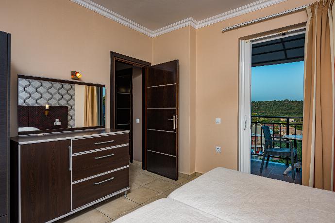 Twin bedroom with A/C . - Villa Dimi . (Photo Gallery) }}