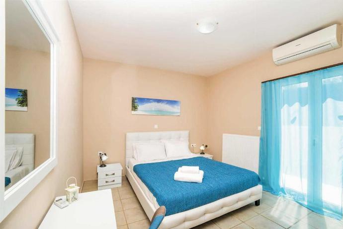 Double bedroom with A/C . - Villa Rea . (Photo Gallery) }}