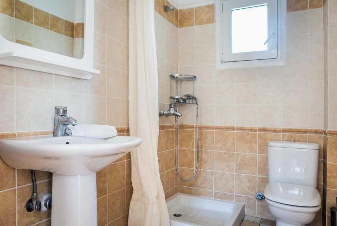 En suite bathroom with shower . - Villa Olga . (Photo Gallery) }}