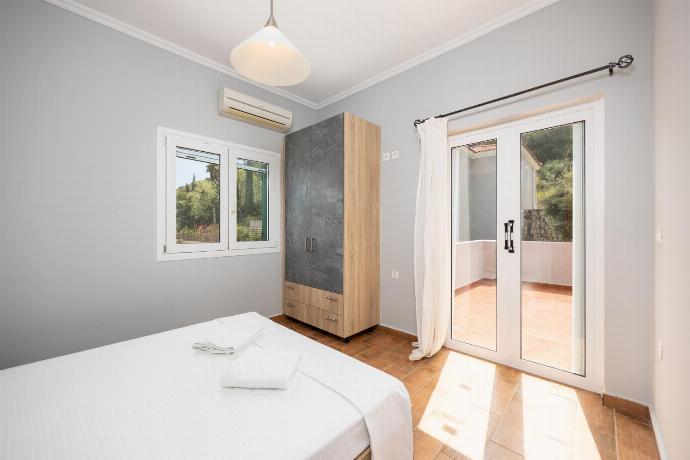 Double bedroom with A/C . - Villa Olga . (Photo Gallery) }}