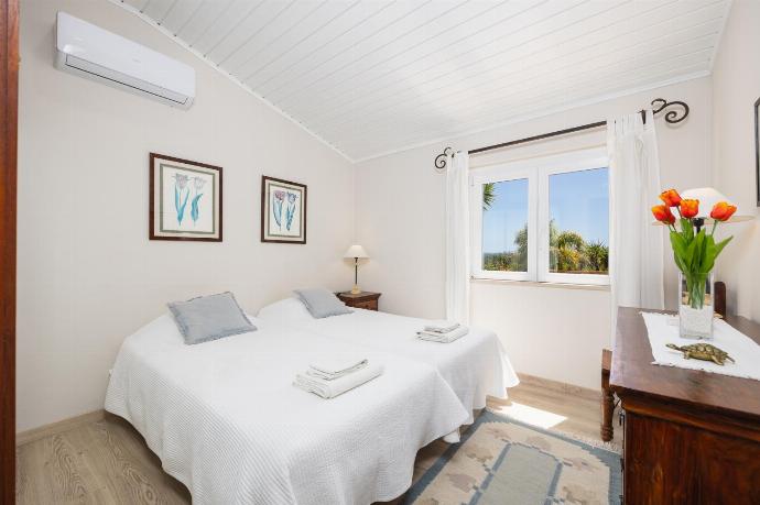 Twin bedroom with A/C . - Villa Irene . (Photo Gallery) }}