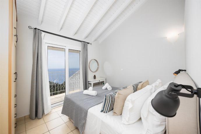 Double bedroom with A/C and sea views . - Villa Jasmine . (Photo Gallery) }}