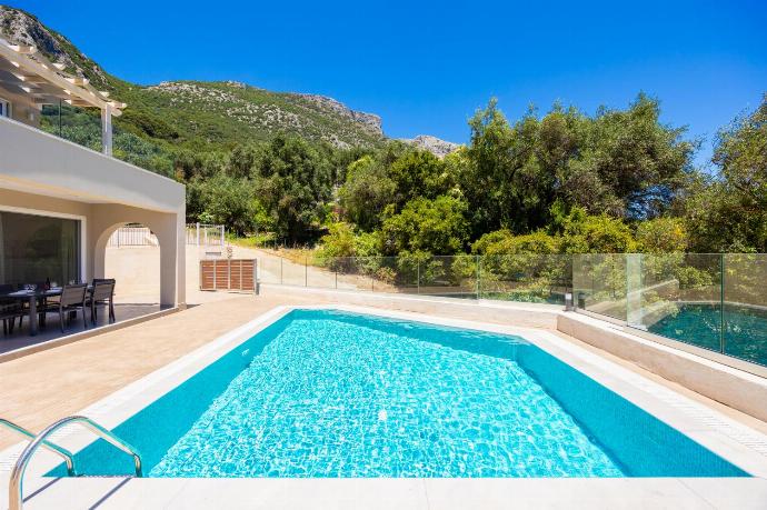 Private pool and terrace with sea views . - Villa Daisy . (Photo Gallery) }}